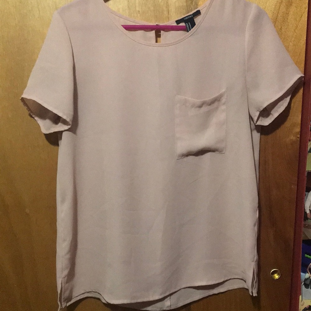 Light pink blouse with pocket in front